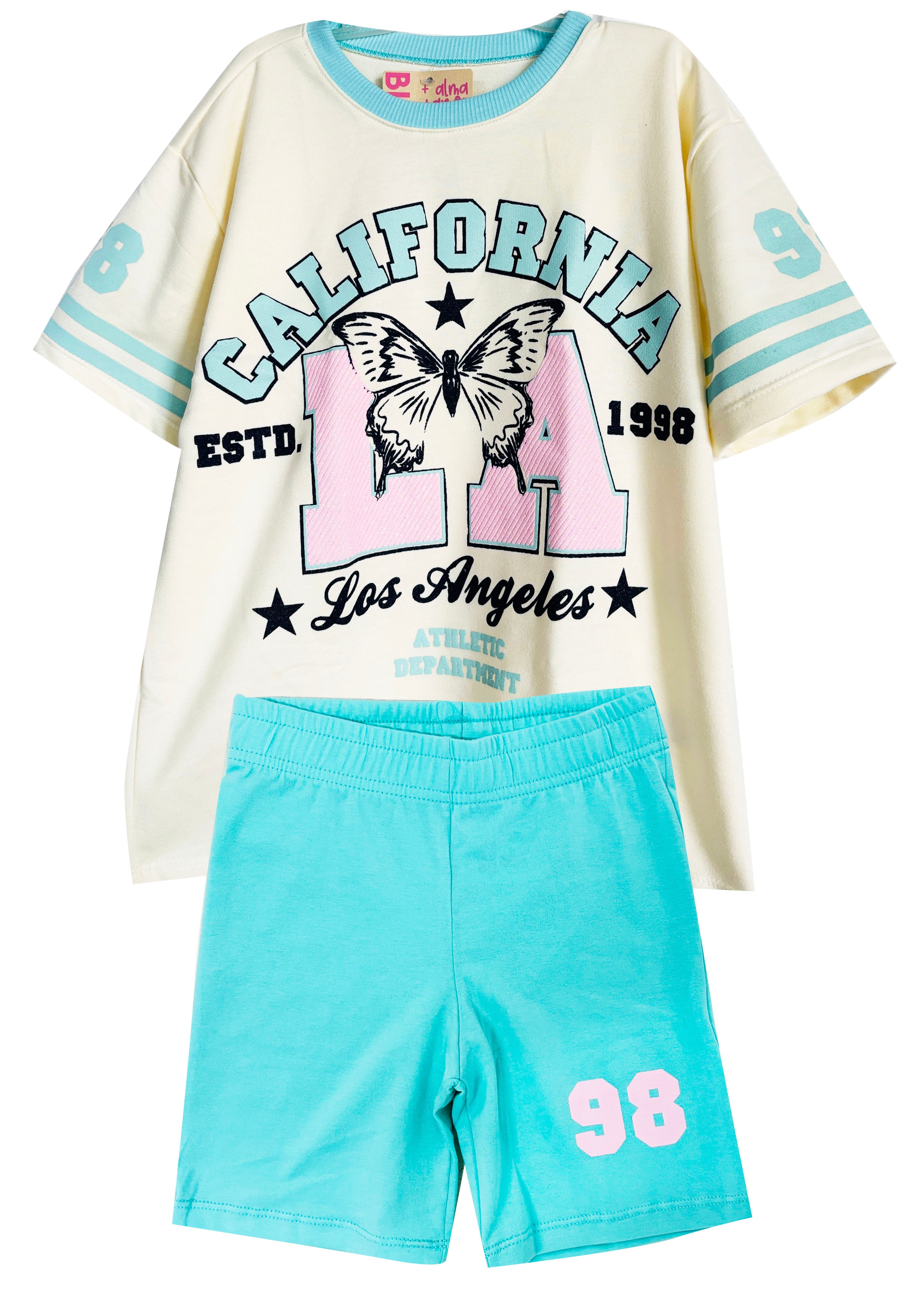 CN2482 CAMISETA OVER SIZE NIÑA MARFIL BIKER AGUAMARINA